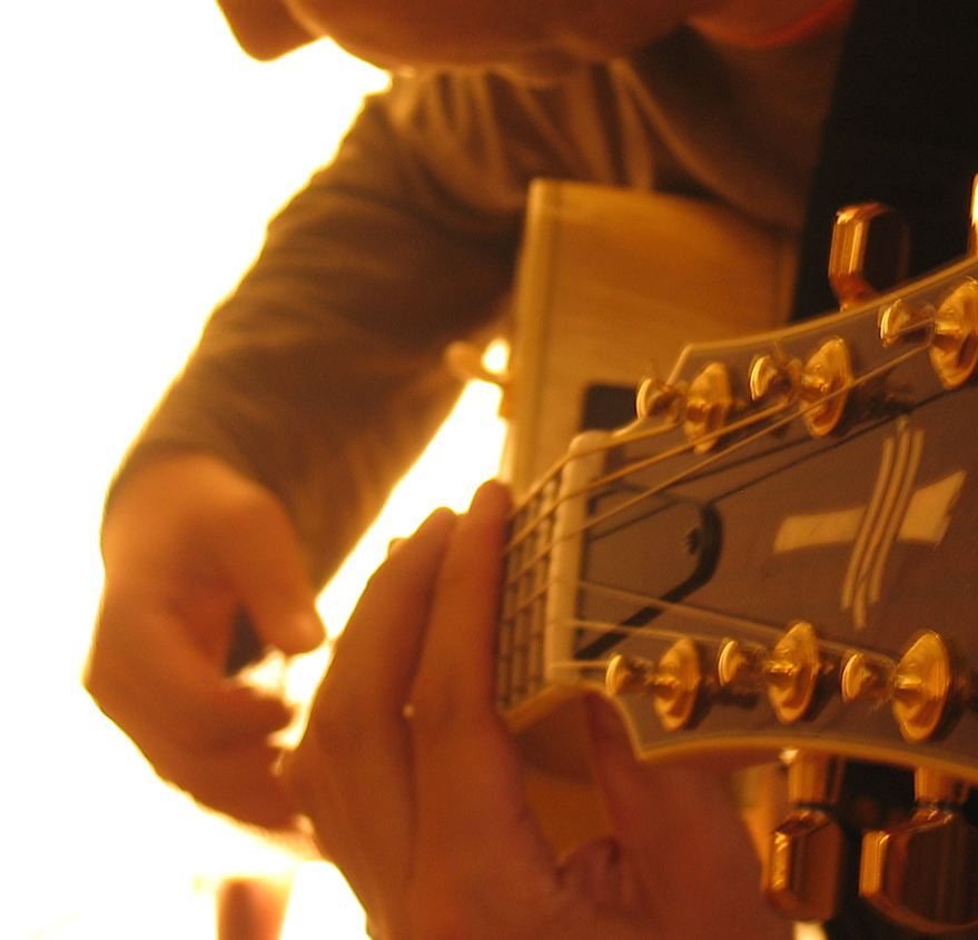 Dan Rochlis playing guitar in a Yamaha archive photo